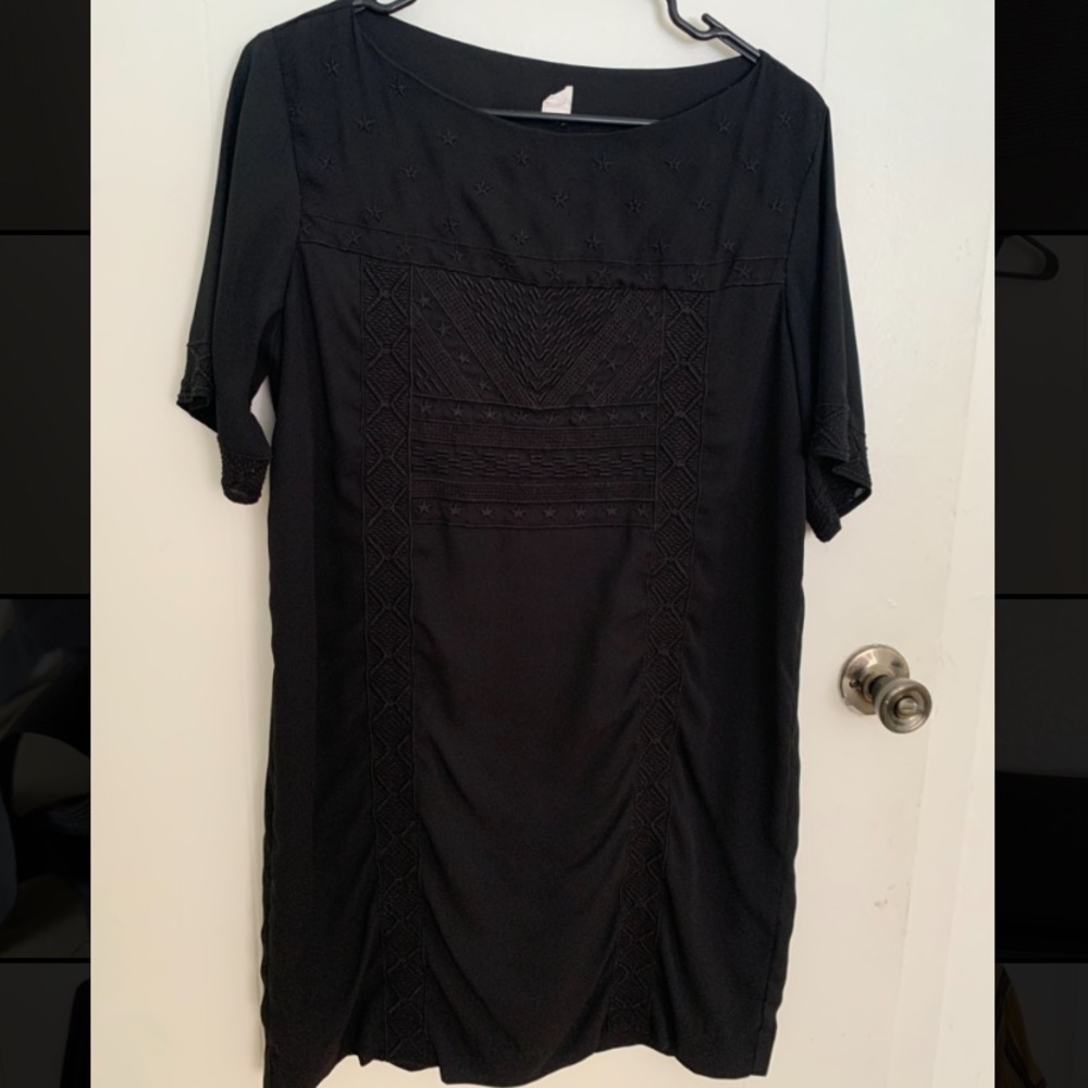 Black shift dress with embroidered details